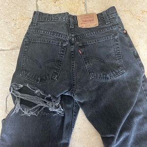 Vintage Levi 550 with a custom rip under the bum